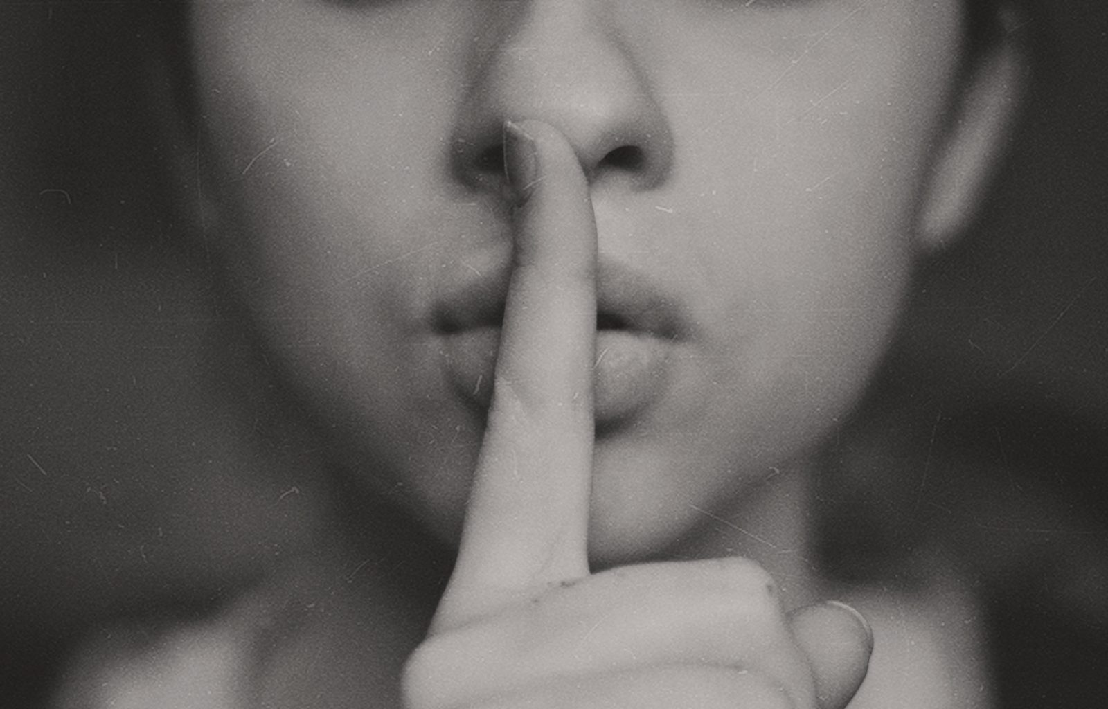 Woman Finger to Lips Shh