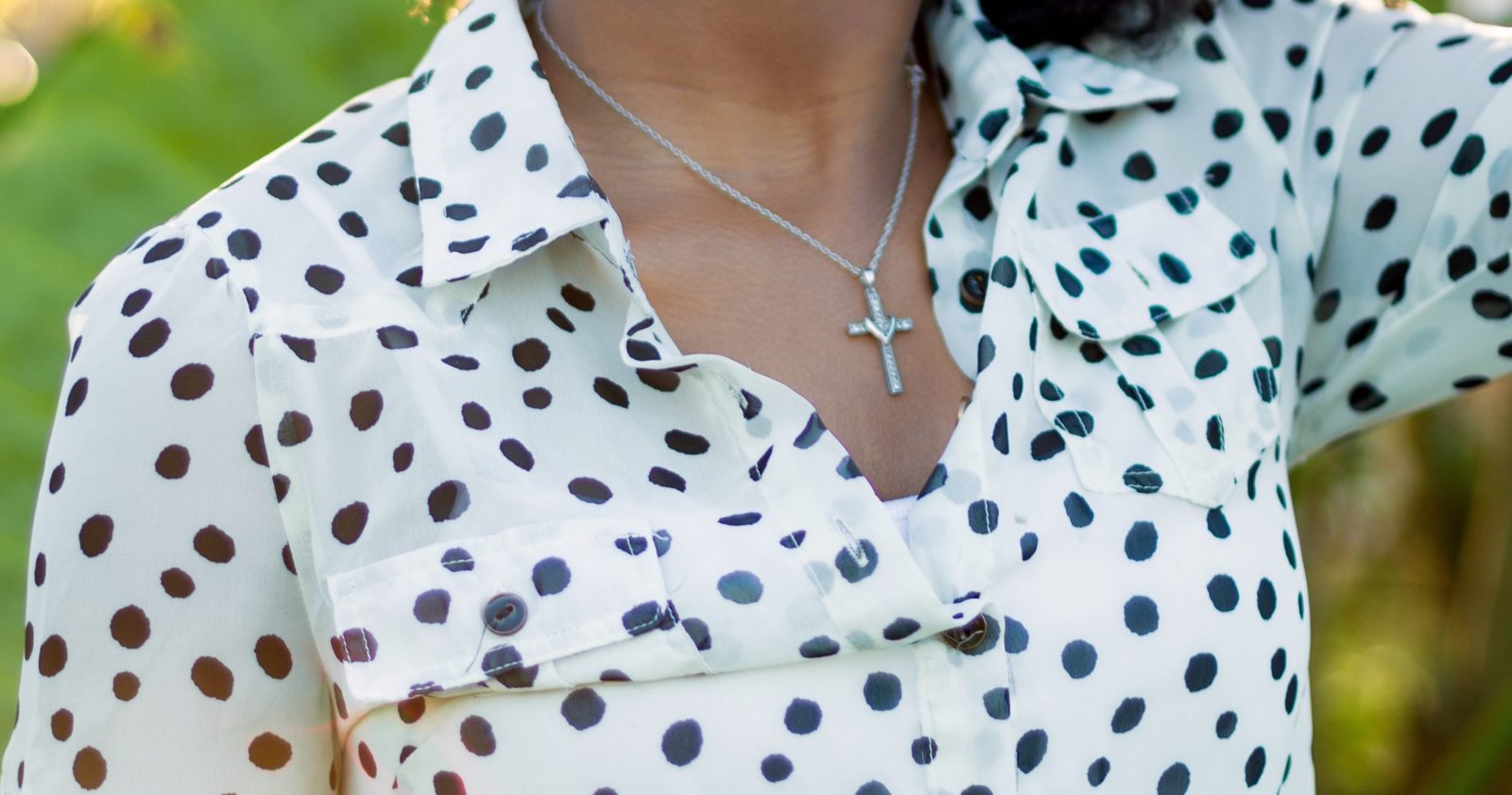 Woman wearing a cross necklace